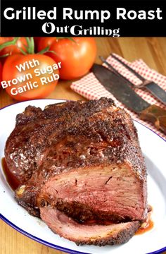 grilled rump roast with brown sugar and garlic rub on a plate next to tomatoes