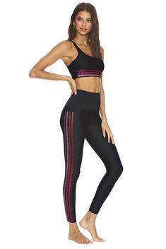 The Jade Legging from Beach Riot is an ultra high rise, full length active pant. The black legging has multi-colored sparkly pink stripes on each side panel. Styled with the Leah Top Model wears size S. Beach Riot, Beachwear Fashion, Athletic Leggings, Side Stripe, Pink Stripes, Black Pattern, Matching Items, Black Fabric, Black Leggings