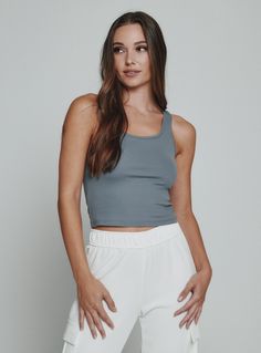 storm-1013 Cropped Athleisure Tank Top For Everyday, Everyday Cropped Athleisure Tank Top, Casual 4-way Stretch Tank Top, Casual Tank Top With 4-way Stretch, Casual Solid Tank Top With 4-way Stretch, Casual Activewear With Scoop Neck And 4-way Stretch, Sporty Tank Strap Tops For Loungewear, Sporty Tank Strap Loungewear Top, Medium Support Cropped Tank Top For Loungewear