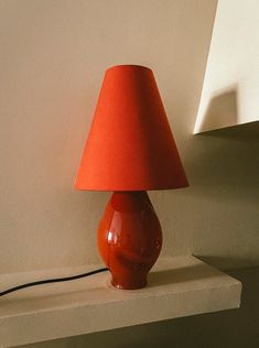 Dark red-conical glass lamp with intricate swirling patterns and gold trim Red Lamp Aesthetic, Venice House, Graphic Shapes, Red Lamp, Cloud City, Lamps Modern, Designer Lamps, Candle Mirror, Vintage Tableware