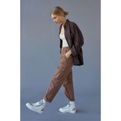 Utility-Look Jeans From Bdg With A Baggy Fit Through The Straight Leg Silhouette. Offers A High-Rise Elastic Waistband And Topped With A Zipper Fly And Snap Button Closure. Available Only At Uo. Content + Care - 100% Cotton - Machine Wash - Imported Size + Fit - High Rise - Straight Leg - Ankle Length - Model In Light Brown Is 5’5” And Wearing Size 26 - Measurements Taken From Size 26 - Waist: 24" - Rise: 12” - Inseam: 25" - Leg Opening: 14” High Waisted Baggy Jeans, Cargo Pants Outfit, Brown Fits, Tomboy Outfits, Wide Jeans, Oversize Hoodie, Baggy Fits, Pants Outfit, Infant Tees