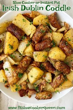 a white bowl filled with cooked potatoes and meat on top of a wooden table next to a green sign that says slow cooker instant pot irish dublin code