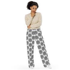 Get the comfort of pajamas in this stylish pair of wide-leg pants. With the adjustable waist and stretchy fabric, it's like your favorite sweatpants but better. * Relaxed unisex fit * Practical side pockets * Elastic waistband with a white drawstring * Can be worn on the waist or on the hips * Premium knit mid-weight jersey fabric * 95% polyester, 5% elastane (fabric composition may vary by 1%) These are totally Zen pants! Black Mandala, Athleisure Pants, Tree Woman, Comfortable Pants, Comfy Sweatshirt, Elastane Fabric, Pantalon Large, Lace Pattern, Mens Trousers