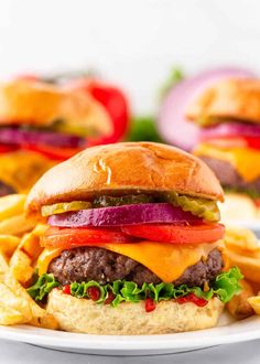 a cheeseburger on a plate with french fries