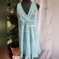 Victoria Secret Size Large Sheer Blue Floral Chemise Sheer Blue Sleepwear For Spring, Summer V-neck Chemise For Daywear, Sheer Light Blue Summer Sleepwear, Blue V-neck Sleepwear For Vacation, Light Blue Sleeveless Spring Sleepwear, Light Blue Sleeveless Sleepwear For Spring, Sleeveless Light Blue Sleepwear For Spring, Spring V-neck Chemise For Loungewear, Victoria's Secret Blue Sleeveless Top