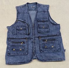 Vintage washed blue denim fishing vest Size: XL Tag: Cowboy Little to no signs of wear or aging Measurements are taken in the photos  Message for additional information on the piece or preferred shipping prices  All items ship within 1-3 business days of purchase  Items are preowned unless otherwise stated  Always happy to do discounts on bundles! Happy hunting!! Outdoor Sleeveless Denim Vest With Pockets, Washed Blue Sleeveless Denim Vest With Pockets, Denim Blue Sleeveless Vest With Pockets, Washed Blue Cotton Vest With Pockets, Washed Blue Sleeveless Vest With Pockets, Denim Blue Vest With Pockets, Dark Wash Denim Vest With Pockets, Denim Vest Men, Nanak Jayanti