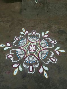 an artistic design is painted on the ground