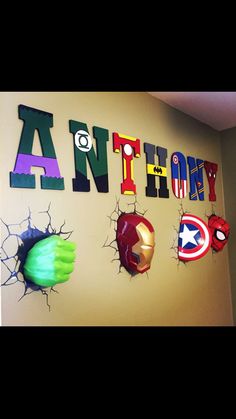 a wall with some avengers decorations on it