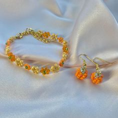 Handmade autumn themed jewellery set made with glass seed beads bracelet and earrings Beaded Pumpkin Bracelet, Pumpkin Bracelet, Seed Beads Bracelet, Pumpkin Jewelry, Orange Bracelet, Bracelets Design, Pumpkin Earrings, Beads Bracelet Design, Bracelet Design