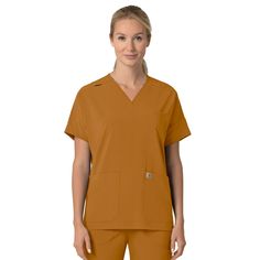 PRICES MAY VARY. Excel at Work: Available in many different colors, our Carhartt Force Cross-Flex scrubs wick sweat, dry fast, and resist odors, making them perfect for any shift Durable Comfort, Built to Move: Rugged Flex stretch technology, polyester-spandex fabric, side hem vents, curved back hem, racerback detail with box pleat for enhanced flexibility Convenient 4-Pocket Design: Welt chest pocket, two large front top load pockets, one mesh cellphone pocket and pen slot Designed for Strength Carhartt Scrubs, Carhartt Womens, Safety Clothing, Polyester Spandex Fabric, Tractor Supply, Curved Back, Work Wear Women, Professional Look, Scrub Tops