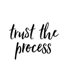 the words trust the process are written in black ink on a white background, and it is