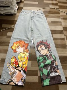 Sold hand-painted pants #handpainted #handpaintedjeans #animejeans #custompants #demonslayer #anime #zenitsu #tanjiroedit #jeans #denimpants Anime Pants Design, Painted Pants Men, Anime Custom Clothes, Painted Jeans Ideas, Drawing On Jeans, Jean Painting Ideas, Woman Expression, Expression Anime