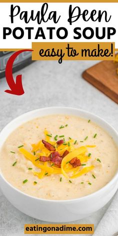 a bowl of potato soup with bacon and cheese on top