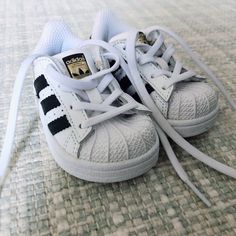 Brand New Adidas Superstars For Baby. Never Worn. From A Pet-Free, Smoke-Free Home. Toddler Adidas, Adidas Baby, Black White, Crib Shoes, White Adidas, Baby Wearing, Kids Shoes, Baby Toddler, Shoes Sneakers