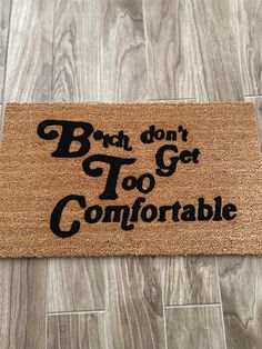 a door mat that says, bad don't get too comfortable