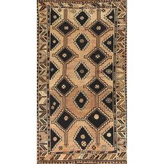 an old rug with black and tan designs on the bottom, in front of a white background