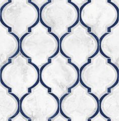 a white and blue tile wallpaper with an intricate design on the bottom half of it