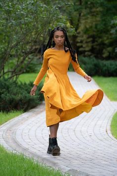 ❃ This beautiful yellow mustard linen dress will bring a ray of sunshine to a cloudy day! The flattering cut makes it easy to wear while you're singing in the rain; the midi length works well with cute ankle boots. Dropped-shoulder long sleeves keep you warm as toast, while the full, gathered skirt with pockets twirls as you skip through puddles!❃ Features• Handmade• Available in 40 colors• Made to Order• Natural fabric, 100% linen• 100% cotton lining• Pockets• Customised skirt length❃ Sizes - P Yellow Maxi Dress For Fall, Flowy Yellow Maxi Dress For Fall, Yellow Midi Dress For Fall, Flowy Linen Maxi Dress With Long Sleeves, Long Yellow Daywear Dress, Yellow Long Sleeve Midi Dress, Yellow Flowy Long Sleeve Maxi Dress, Mustard A-line Dress For Spring, Casual Yellow A-line Maxi Dress