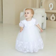 Celebrate your little one's special day in timeless elegance with our Christening Dress Baby Girl collection. Crafted with the finest lace and delicate details, these dresses are designed to make your baby girl look and feel like a true angel. From the intricate embroidery to the soft, comfortable fabrics, every element of this Baptism Blessing Dress has been carefully curated to ensure your daughter looks her absolute best. Pair the dress with the coordinating bonnet and shoes for a complete, p Short Sleeve First Communion Dress, Elegant Baptism Dress With Lace Trim, Summer Baptism Princess Dress With Lace Trim, Cute Cotton Baptism Dress For Dress-up, Classic Baptism Dress With Lace Trim, White Lace Trim Baptism Dress For Babies, Christening Dress Baby Girl, Baby Lace Dress, Blessing Dress