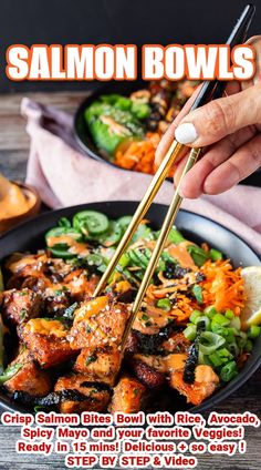 someone is holding chopsticks over a bowl of food with vegetables and meat on it