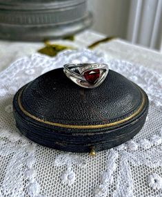 Featuring a dazzling vintage Art Deco Revival solid 10K white gold size 7.5  statement ring adorned with dazzling genuine faceted Garnet gemstone accented with brilliant sparkling CZ crystals .  Ring is approximately size 7.5  at 3.31  grams and is in excellent vintage condition with all stones intact and accounted for.  Hallmarked 10K  on the inside of band this is a stunning piece, shines  beautifully and is ready to wear and pass on for  generations. Please feel free to contact me with any qu Garnet Gemstone, Beautiful Gifts, Gorgeous Necklaces, Vintage Art Deco, Garnet, Beautiful Rings, Ring Verlobung, Vintage Art, Statement Rings