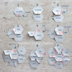 the instructions for how to make hexagons out of paper on a wooden table