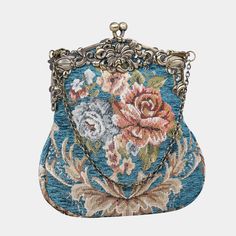 Introducing our captivating collection of Chatelaine purses, inspired by the elegance of the Victorian era.Available in three sizes—Large, Medium, and Small—these purses offer versatility and style. The Large and Medium sizes can be used as both a clutch and a crossbody purse, as we provide two chains for each size: 50" and 13" in length. This allows you to effortlessly switch between crossbody and clutch styles.Let's focus on the Chatelaine Large Crossbody Purse:With a frame width of 6.25" and a height of 8", this purse comfortably holds larger items like the iPhone 14 Pro Max and a passport. It features a small slip pocket for cards or small essentials, and the 1.5" bottom depth provides ample space for your necessities.The Large Crossbody Purse includes two chains, each with brass hooks Elegant Handheld Wallets For Daily Use, Elegant Handheld Wallet For Daily Use, Elegant Handheld Travel Wallets, Elegant Handheld Travel Wallet, Vintage Clutch For Daily Use, Handmade Elegant Rectangular Wallet, Elegant Handheld Evening Wallet, Vintage Blue Rectangular Wallets, Vintage Blue Rectangular Wallet