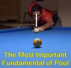 a man leaning over to hit a pool ball