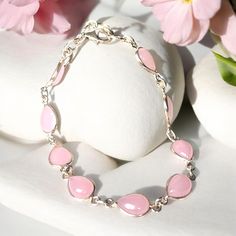 🌹Teardrop Shaped Pink Stone Gemstone  Bracelet  A beautiful piece of jewellery made of 925 sterling silver teardrop-shaped Rose Quartz gemstones. The length of the bracelet is adjustable, up to 8.25 inches, and matching earrings are also available. This listing is for 1 rose Quartz Bracelet.  🌟ROSE QUARTZ Healing Properties: Rose Quartz is known for promoting love, compassion, and kindness. This beautiful gemstone carries a soft feminine energy and helps to raise self-esteem.  cleanses the hea Sterling Silver Teardrop Bracelet As Gift, Silver Drop Jewelry For Mother's Day, Rose Quartz Healing, Rose Quartz Jewelry, Quartz Gemstones, Stone Jewellery, Rose Quartz Bracelet, 1 Rose, Quartz Jewelry