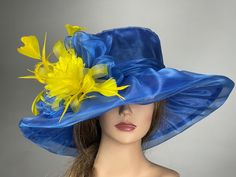 Blue Cloche Hat For Spring, Blue Hats For Church In Spring, Blue Spring Hats For Church, Blue Mini Hats For Summer Races, Blue Church Hats For Spring, Blue Spring Church Hats, Fitted Royal Blue Hat For Summer, Elegant Blue Top Hat For Races, Royal Blue Curved Brim Hat For Spring