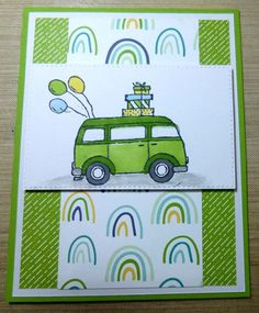 a card with a green van and balloons