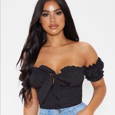 Black Crop Top With A Tie Front Design Brand New With Tags Summer Crop Top For Going Out, Trendy Black Off-shoulder Tops, Fitted Tops For Going Out In Summer, Flirty Short Sleeve Top For Night Out, Trendy Summer Tops For Going Out, Spring Black Crop Top, Black Off-shoulder Crop Top For Night Out, Flirty Black Crop Top, Flirty Black Cropped Top