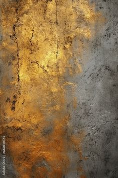 an abstract painting with gold and grey colors