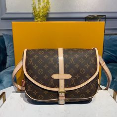 Description L.V Saumur MM Monogram Canvas For Women, Women’s Handbags, Shoulder And Crossbody Bags 11in/28cm LV M40710 Rep 1:1 Size: 30 x 12 x 24 cm / 11.8 x 4.7 x 9.5 inches (Length x Width x Height) Celebrate the House’s signature elegance with the Saumur MM in Monogram canvas. Carefree cross-body carry adds modern appeal, while exquisite trimmings accentuate its feminine shape. Golden color metallic pieces Embossed L.V signature on front 2 compartments with secure, adjustable closure Interior flat pocket in rear compartment Soft textile lining Strap: Not removable, adjustable Includes dust bag. This product is of the best quality. Louis Vuitton Saumur, Mm Monogram, Soft Textiles, Canvas Handbags, Evening Clutch Bag, Tote Backpack, Monogram Canvas, Louis Vuitton Handbags, Fashion Handbags