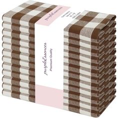 six brown and white striped napkins stacked on top of each other