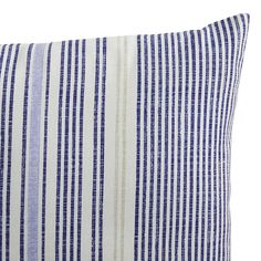 a blue and white striped pillow on a white background