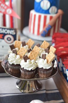 cupcakes and crackers on a cake stand at a sports themed birthday party