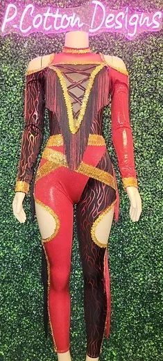 a female mannequin is dressed in red and gold