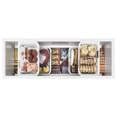 an open refrigerator with food in it and on the bottom shelf is filled with different foods