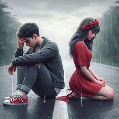 a man and woman sitting on the ground in the rain with their hands to their faces