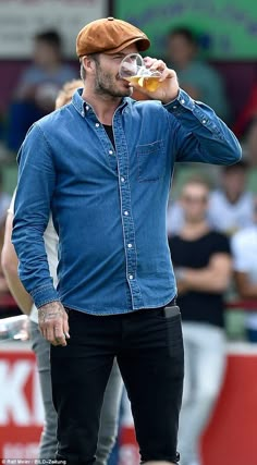 Doting dad: David was spotted mingling with the other parents as the team came off the pit... Military Cap Outfit, David Beckham Country Style, David Beckham Fashion 2022, David Beckham Baseball Cap, Hot David Beckham, Lumberjack Style