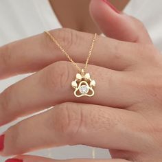 10k 14k 18k Solid Gold Paw Necklace, Dog Paw Charm Necklace, Pet Memorial Necklace, Paw Print Necklace For Dog Lover, Dog and Cat Paw Charm  This necklace is handmade and produced with 10k 14k 18k solid gold according to your preference. Material : 10kt 14kt 18kt Solid Gold Gold Color : Yellow Gold, White Gold, Rose Gold Gemstone : Cubic Zirconia Pendant size: Heigth : 0.39 inches ( 10 mm ) Width : 0.39 inches ( 10 mm ) We have 3 types solid gold chain options: Type1 Chain (0.85mm thick) Type2 C Gold Jewelry With Paw Print For Anniversary, Elegant Paw Print Necklace For Gift, Gold Paw Print Jewelry For Mother's Day, Mother's Day Gold Paw Print Jewelry, Paw Necklace, Pet Memorial Necklace, Paw Print Necklace, Solid Gold Chains, Memorial Necklace