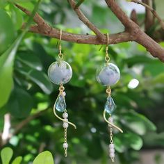 Experience the serene beauty of Japanese wind chimes with these earrings. Real flowers and glass bead tassels add elegance to any outfit. Nature-inspired and perfect for any occasion, they sway gracefully with every step. Handcrafted with care, these earrings feature real flowers encased in shimmering glass beads. They blend Japanese style with natural charm, making them a must-have accessory. Embrace the timeless appeal of these nature-inspired earrings. The long tassels and Japanese design cre Elegant Tassel Earrings With Round Beads, Chime Earrings, Japanese Earrings, Japanese Wind Chimes, Bead Tassels, Real Flower Earrings, Design Japonais, Earrings Real, Beaded Tassel Earrings