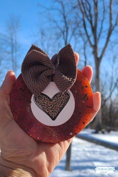 Burgundy and brown leopard print heart car freshie! Adorned and decorated as pictured. 3.5" in diameter Scent Whipped Coffee- warm vanilla, caramel, roasted coffee with almond undertones.  Hang in your car, closet, or locker as a delightful scent. Will last 3-4 weeks depending on your weather/ climate. Afterwards, you Yellow Glitter, Brown Leopard