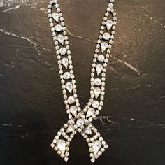 Beautiful Vintage Rhinestone Necklace. Signed Kramer. Very High Quality Stones In Perfect Condition. 14” Long With 1” Dangle. Hook Clasp. Classic Rhinestone Necklaces For Formal Occasions, Classic Evening Necklaces With Rhinestones, Classic Evening Necklace With Rhinestones, Classic Crystal Necklace With Rhinestones, Classic White Necklace With Rhinestones, Classic White Rhinestone Necklace, Diamond White Rhinestones Necklace For Evening, Formal White Necklace With Rhinestones, Vintage Rhinestone Necklace