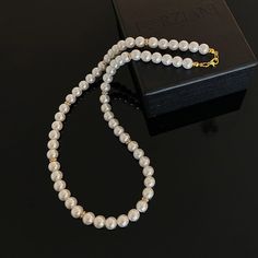 In a world saturated with mediocrity, nothing can rival the authenticity of traditional luxury. This subtly opulent necklace showcases genuine white freshwater pearls, elegantly interspersed with lab diamond studded rondelles in gold. Hand-strung with care in our Orlando studio, this gorgeous necklace is secured with a gold bonded lobster clasp. Our Men's Pearls Collection, features sophisticated fresh water pearl necklaces and bracelets, designed especially for men. Drawing inspiration from his Elegant Round Pearl Chain Beaded Necklace, Elegant Pearl Chain Beaded Necklace, White Pearl Beaded Necklaces In Rondelle Shape, White Pearl Beaded Necklace In Rondelle Shape, Elegant Formal Beaded Necklace With Pearl Charm, Elegant Pearl White Round Beaded Necklace, Elegant Beaded Pearl Necklaces For Formal Events, Elegant Akoya Pearl Beaded Necklace As Gift, Elegant Akoya Pearl Beaded Necklace For Gift