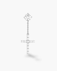 The earring everyone’s been asking for: the Hanging Cross Stud Earring. This unique men’s silver earring has a studded cross dangling from a 1ct diamond simulant stud for delicate movement and maximum style. Diamond Cross Earrings, Mens Earrings Studs, Cross Earrings Studs, Solid Gold Chains, Diamond Simulant, Diamond Cross, Stone Studs, Cross Earrings, Silver Shop