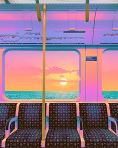 an empty train car with the sun setting over the ocean as seen from it's seats