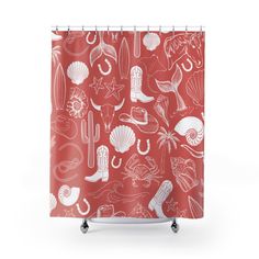 a red shower curtain with shells and seashells on it