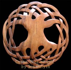 a wooden object with an intricate design on it